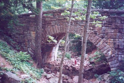 Carridge Road Bridge and hiker on trail.