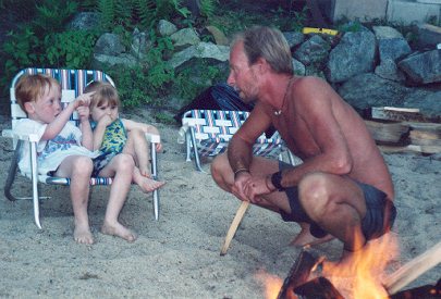 Patrick, Julliette and Tim at the campfire near the pond.