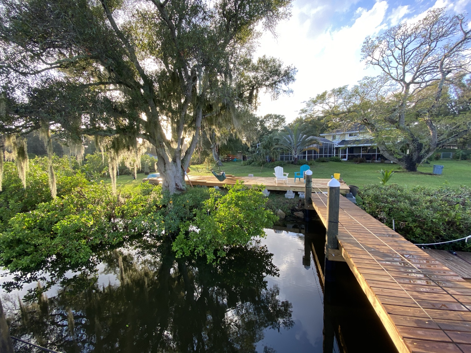 The long dock leading through the mangroves from the backyard to Allen's Creek.