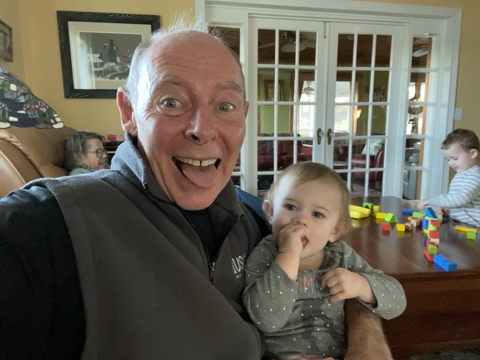A joyful moment inside the house with my granddaughter.