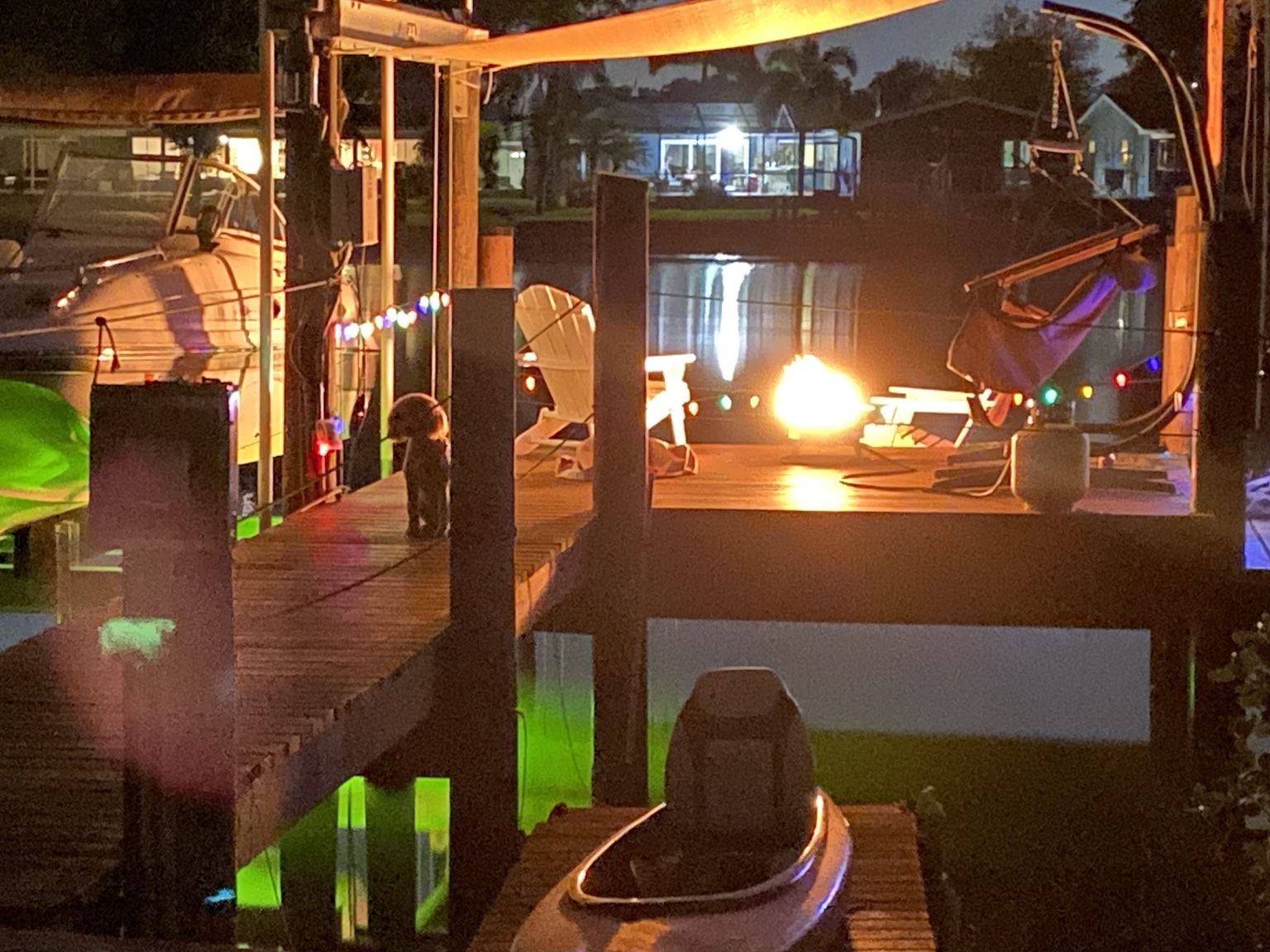 Firelight reflecting across the waterfront on a memorable evening.