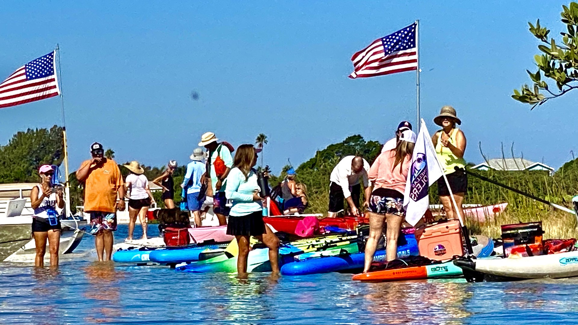 Paddlers arriving at Buccaneer Island on a clear October day
