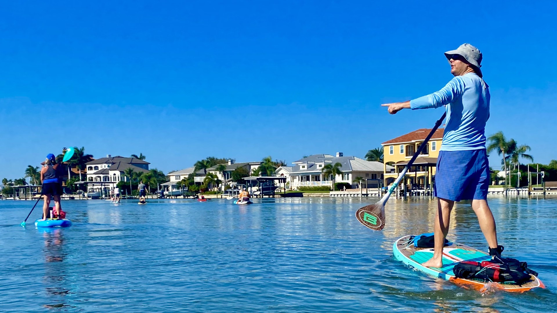 Pinellas Paddlers crossing calm water near Belleair Beach