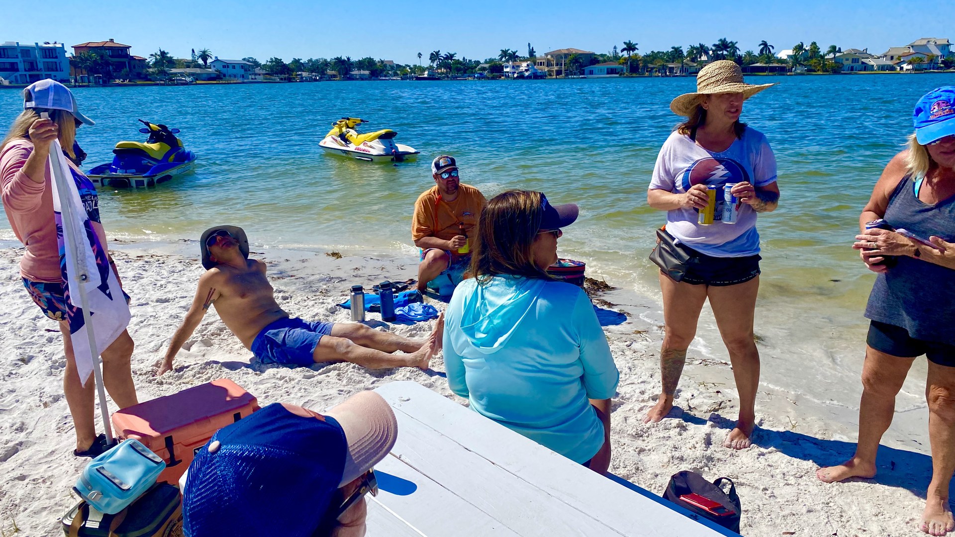 Paddlers and dogs enjoying the beach stop