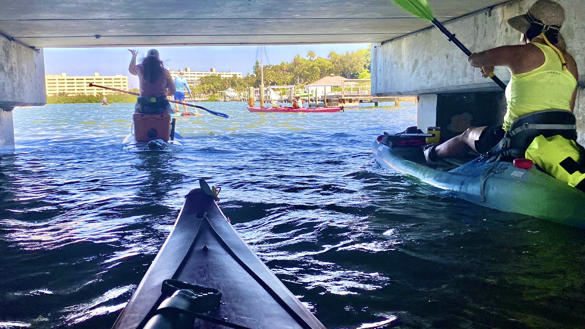 Kayaks passing beneath the Belleair Causeway bridge