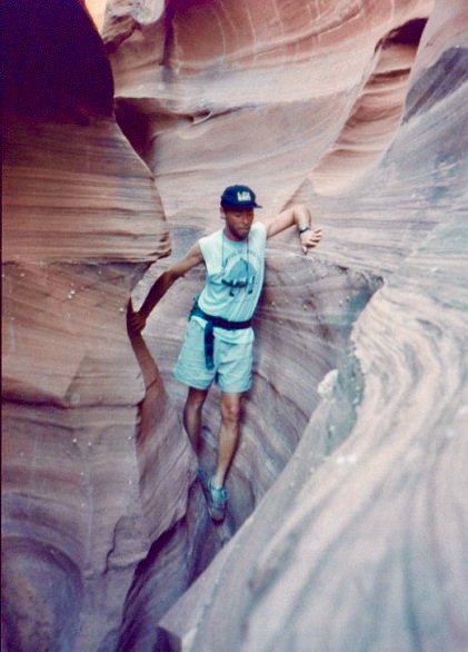 Working through a narrow slot canyon, another reminder that hiking has never meant only walking on ordinary trails.
