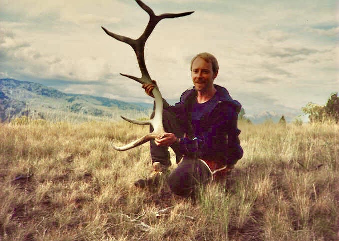 Tim holding a large shed antler discovered while exploring open country in the Lamar Valley