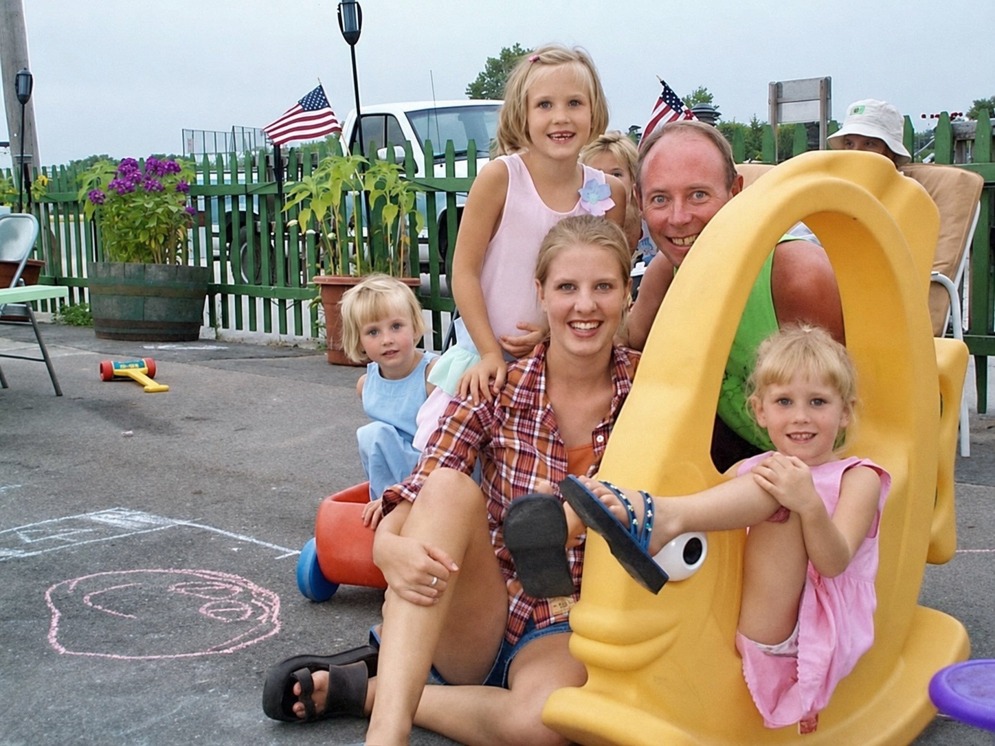 Juliet, Tim, Michelle, Izzy, and Lily at a playground