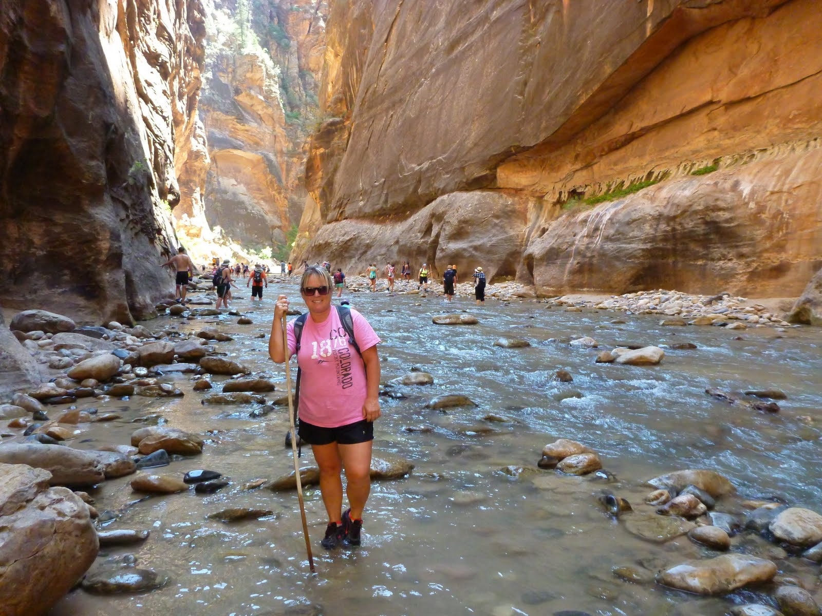 Cindy in one of the most beautiful golden-walled sections of the hike.