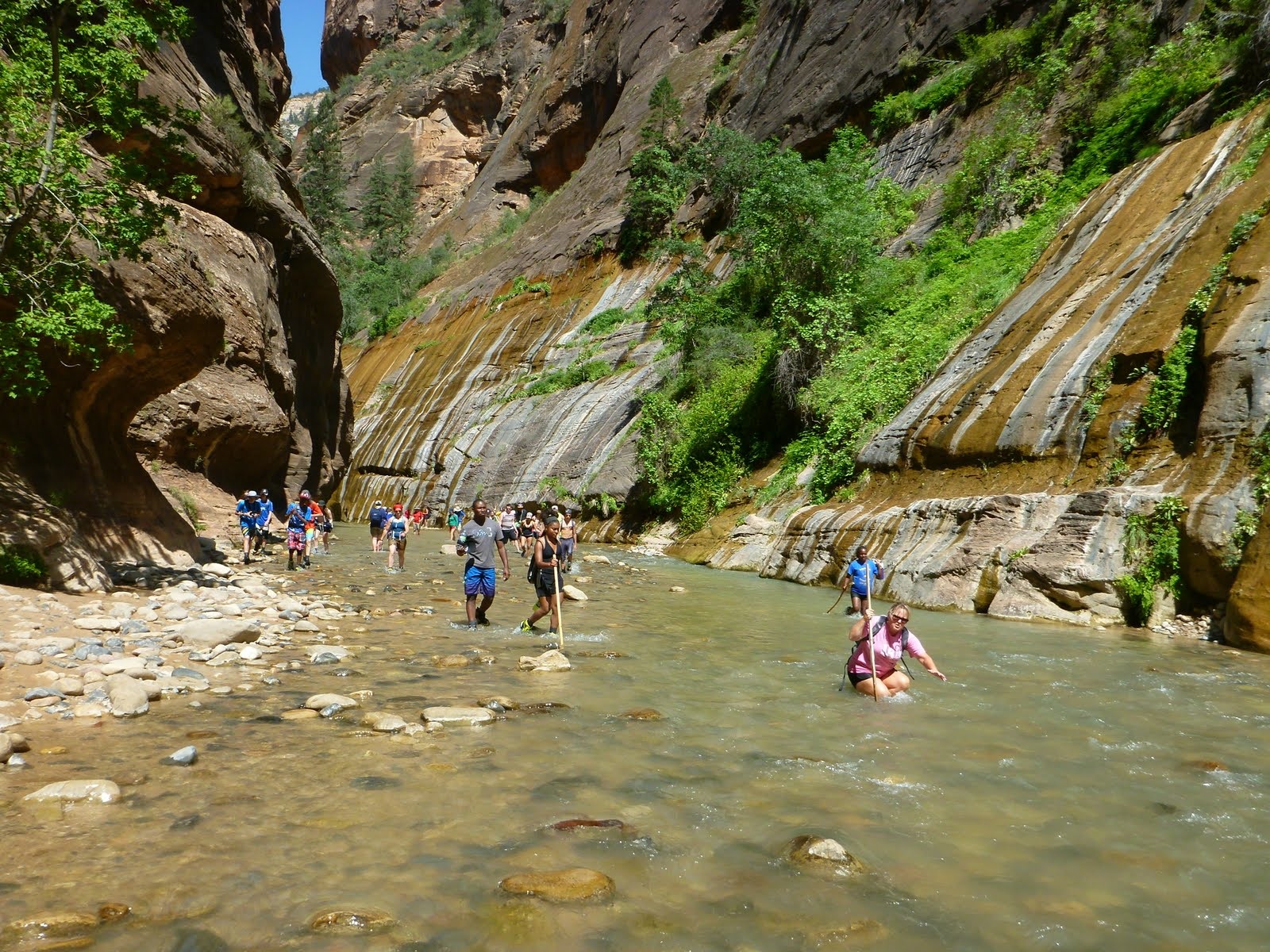 A broad, sunlit crossing where the canyon briefly opens.