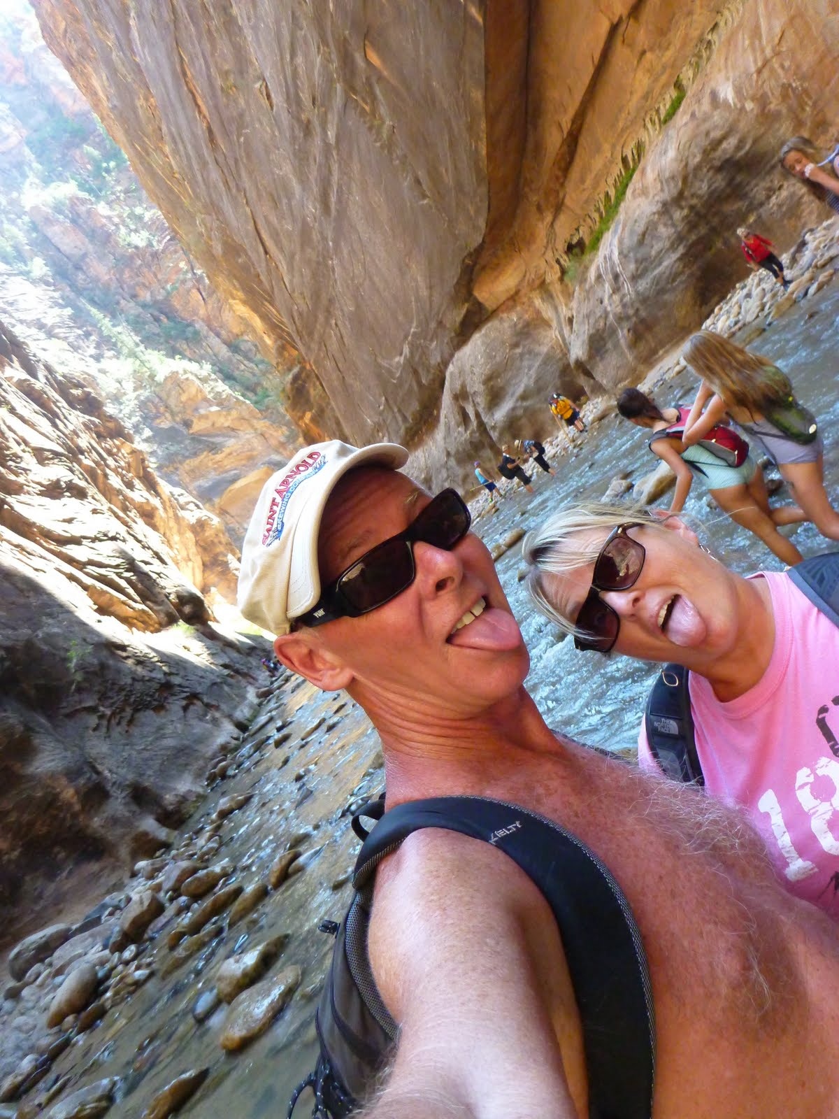 A vertical self-portrait beneath the glowing canyon walls.