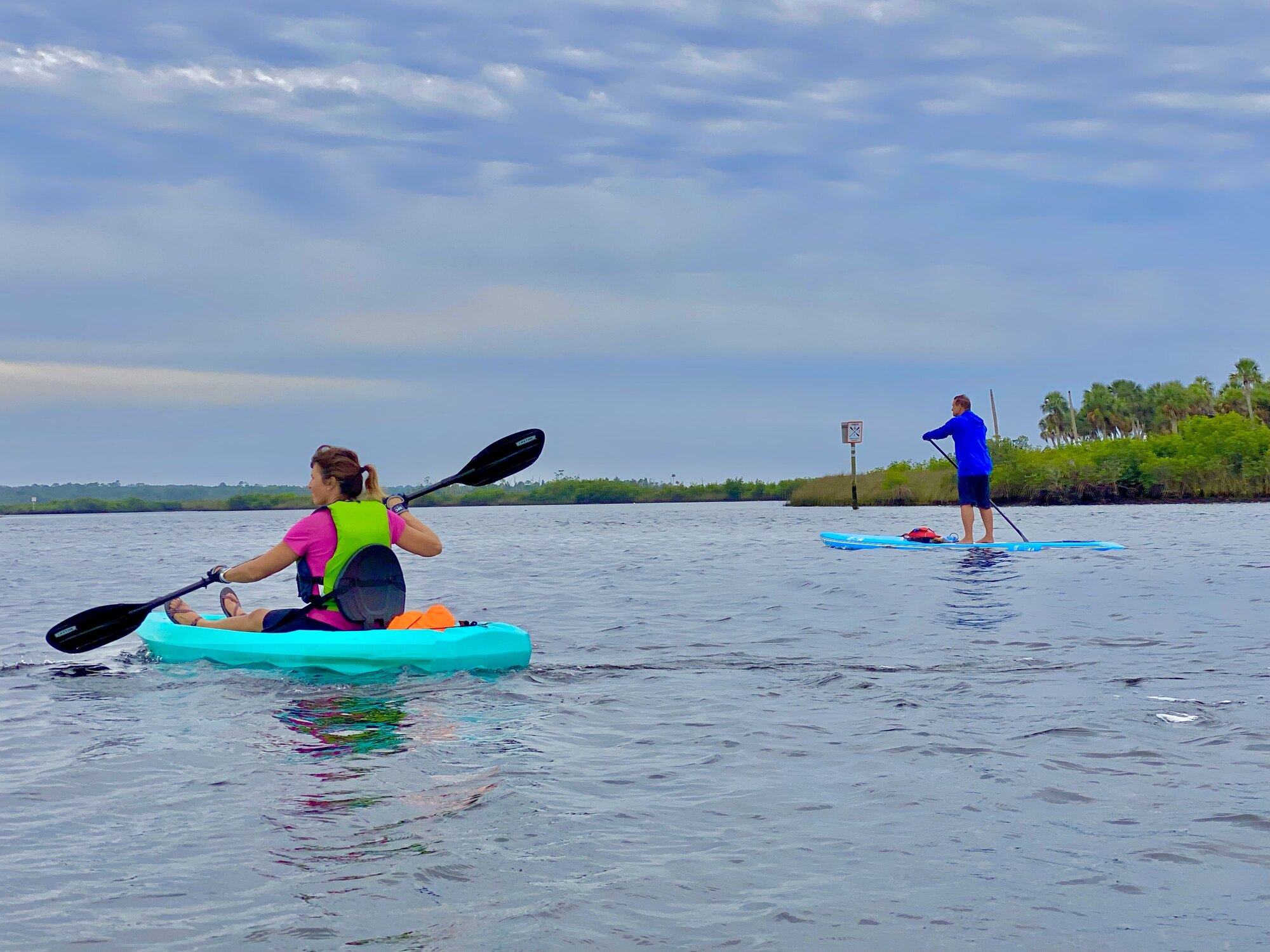 Diana and David crossing open coastal water