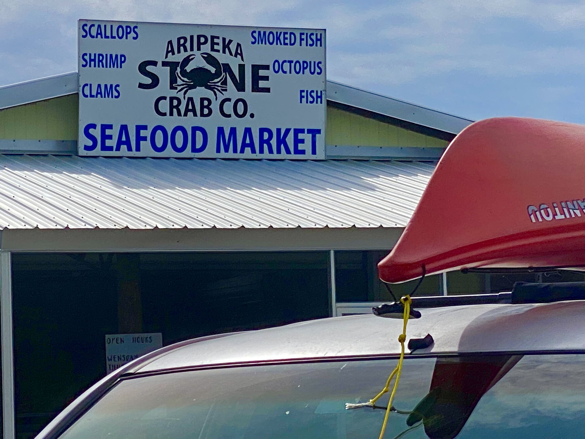 Aripeka Stone Crab Company seafood market sign