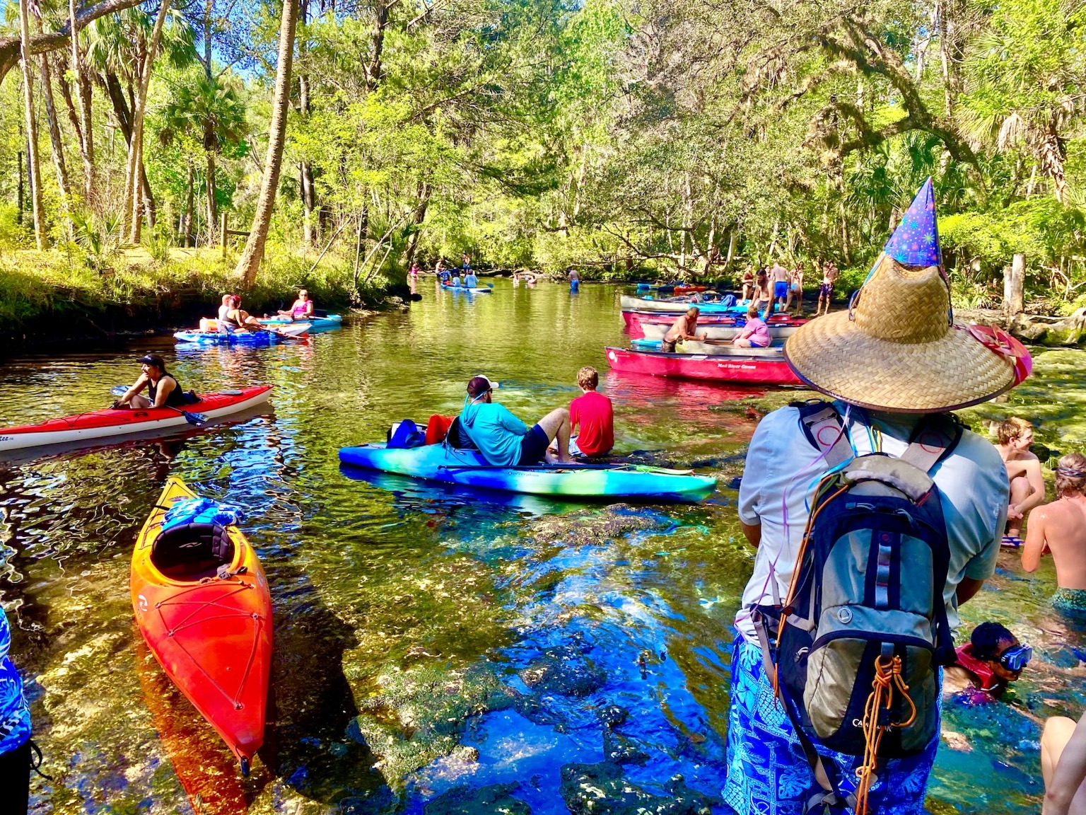 Layne beside the kayaks at one of the spring stops.