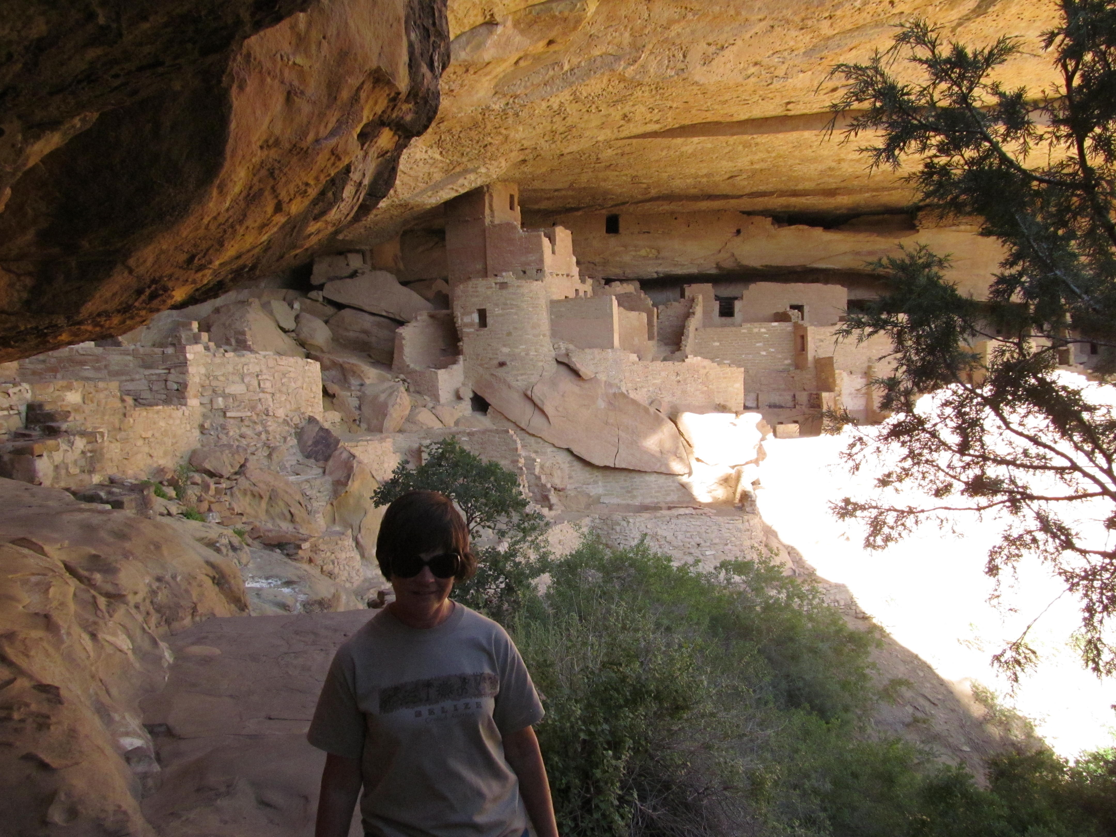 The first close view of Cliff Palace as the trail descends toward the alcove.