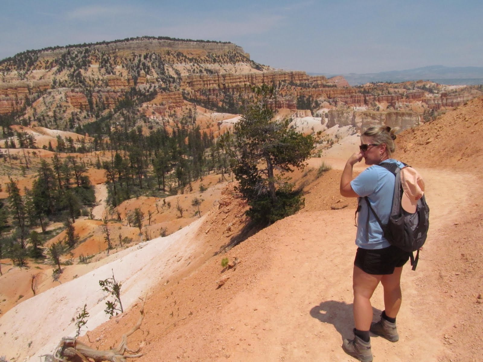Cindy standing at a high overlook above the Bryce Canyon amphitheater.