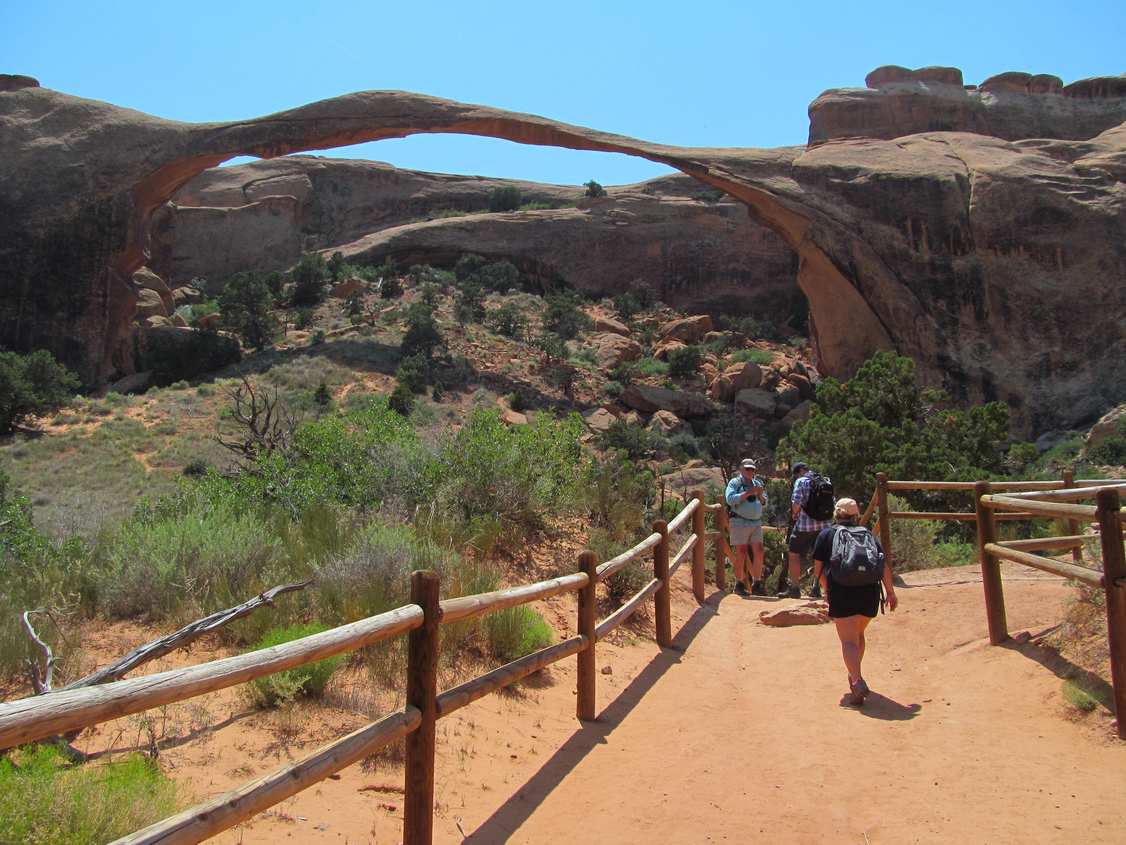 Landscape Arch stretching impossibly thin across the sandstone basin.