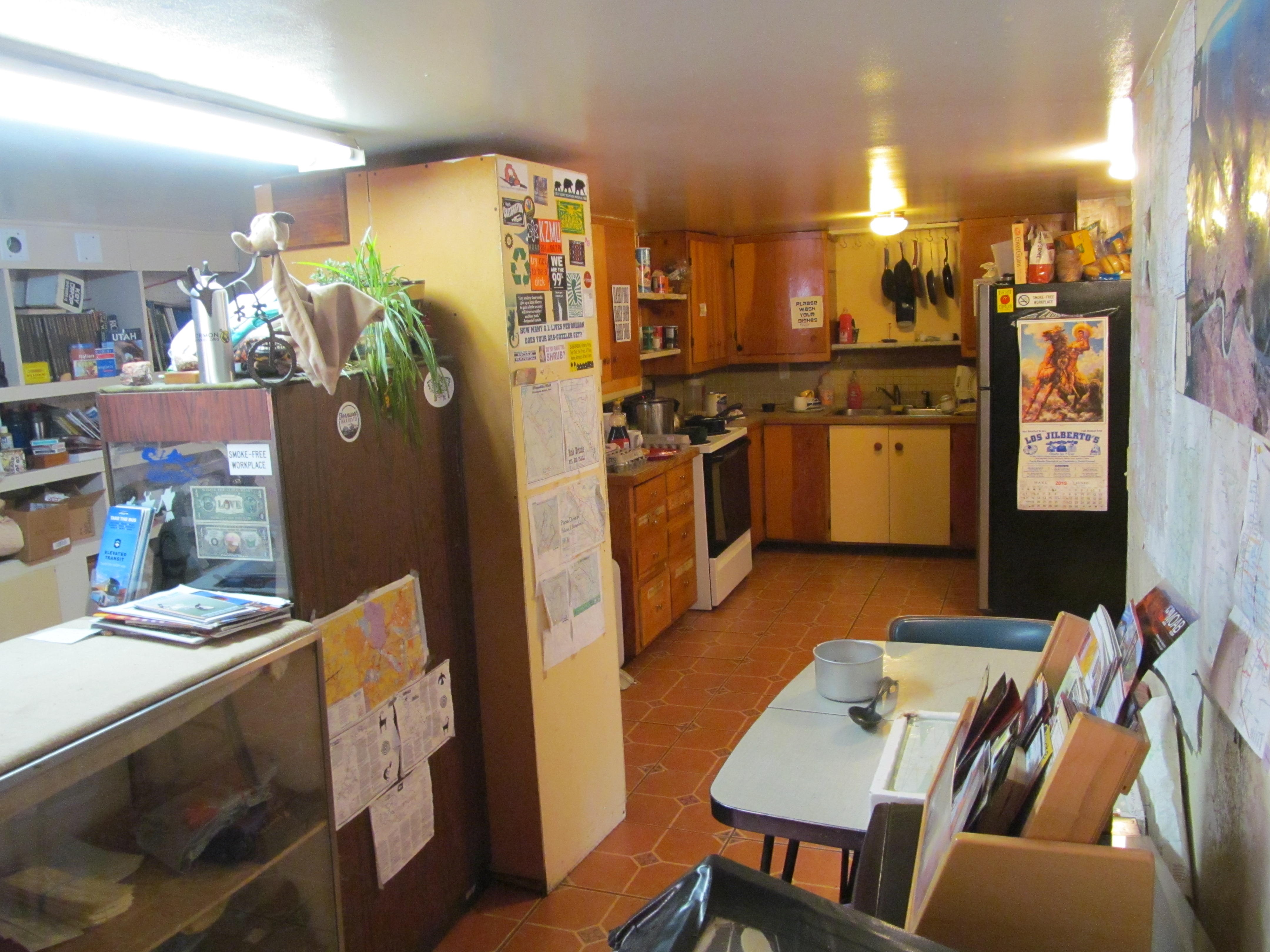 The colorful communal kitchen at the Lazy Lizard hostel.