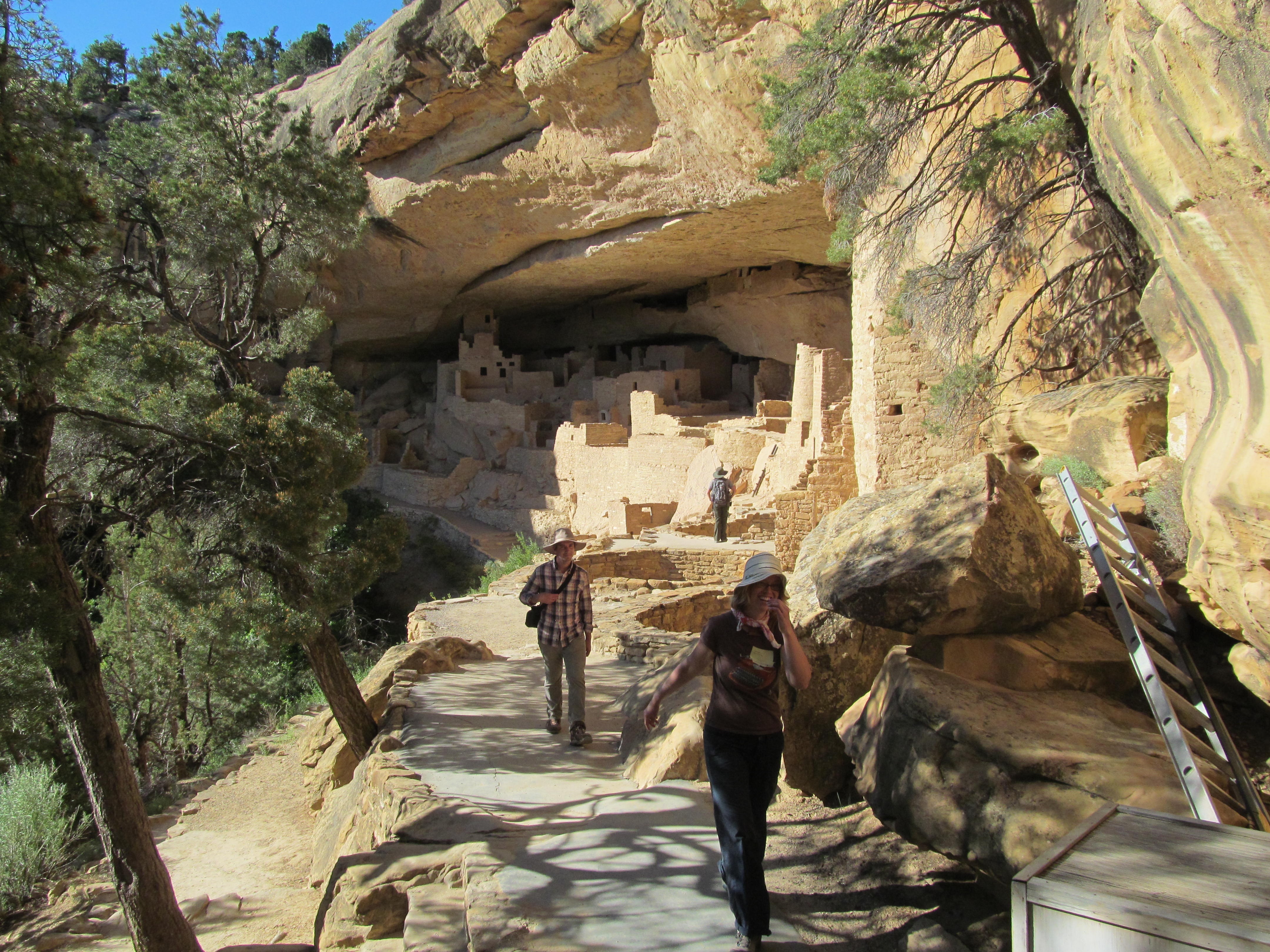 Climbing away from the cliff dwelling along the narrow exit route.