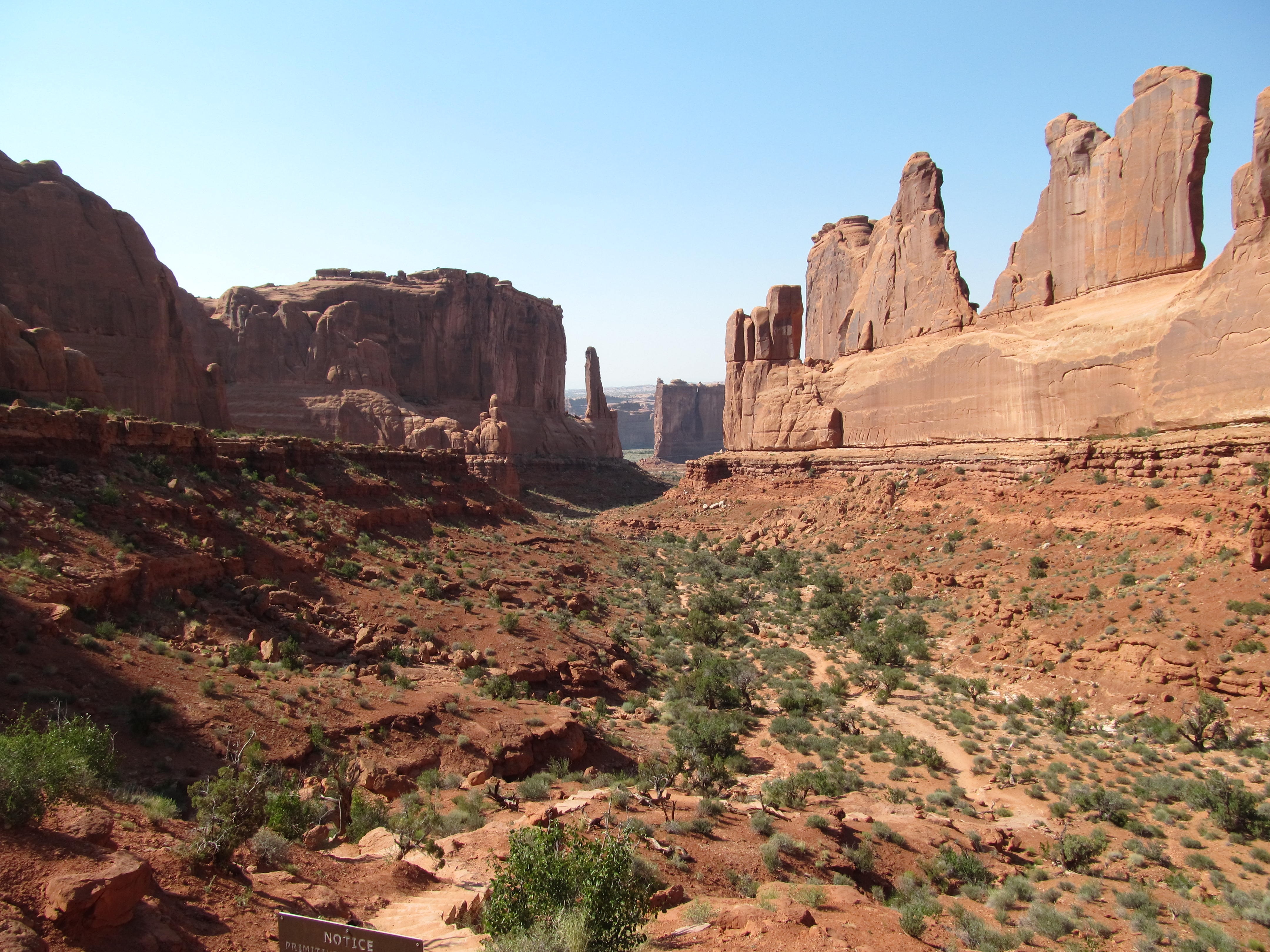 The towering walls and monoliths of Park Avenue in Arches National Park.