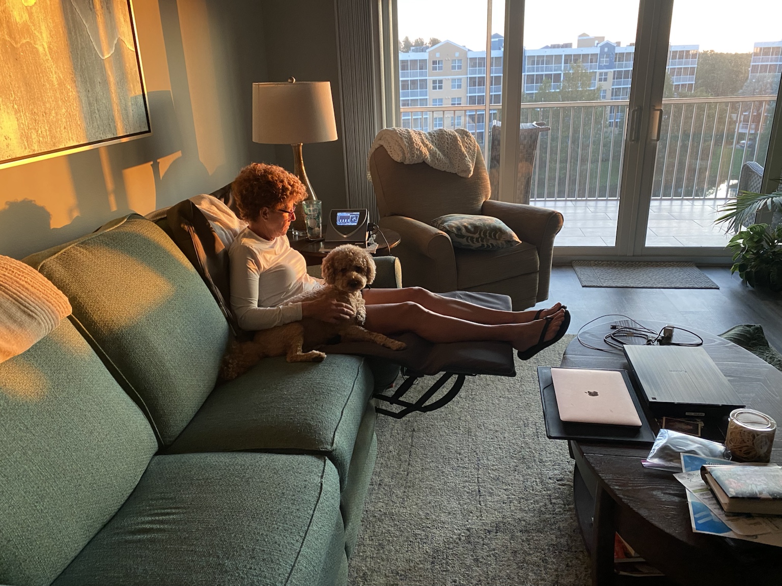 Kym and Buddyboy relaxing together in the warm late-afternoon light at home.
