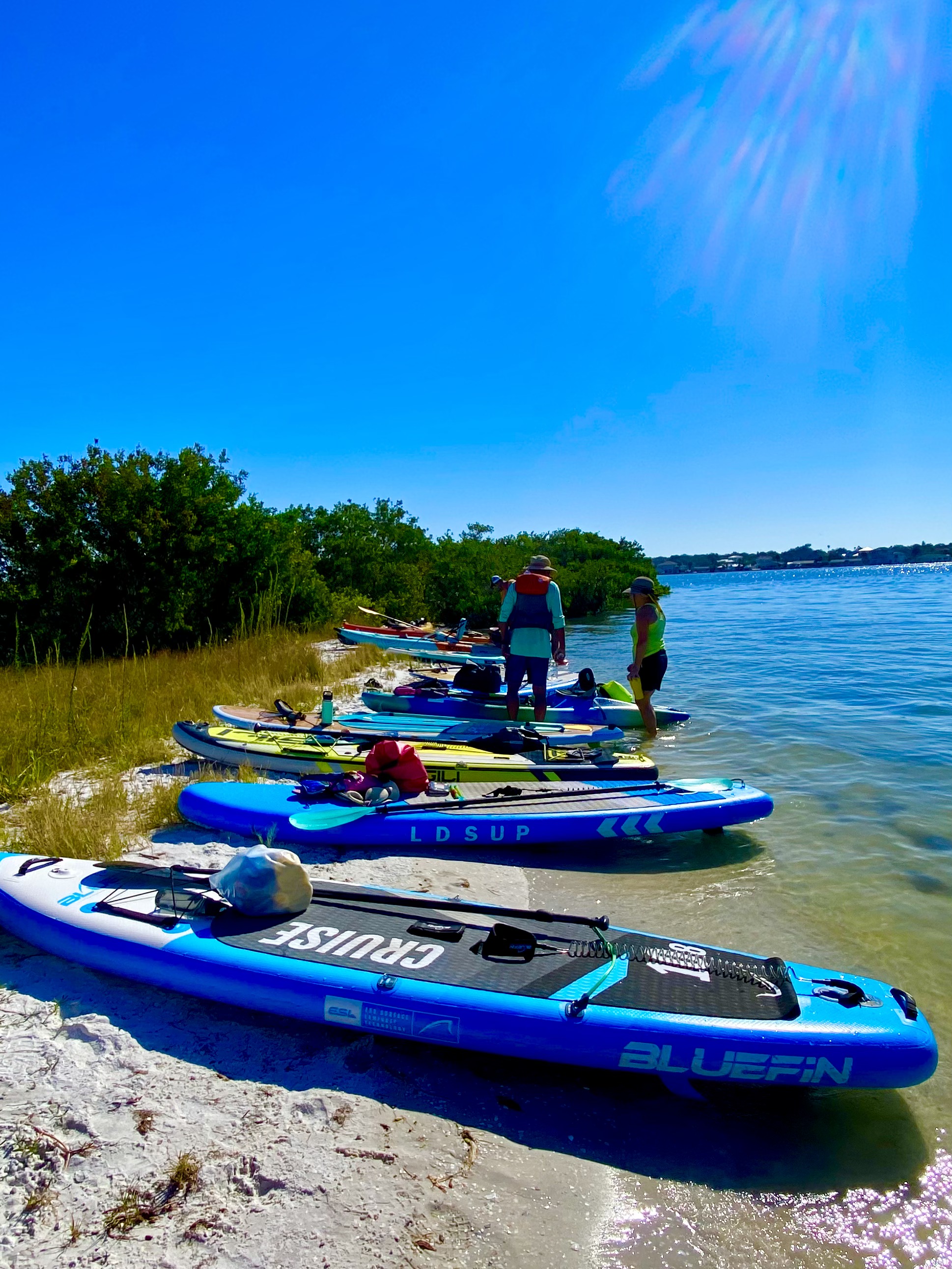 Boards pulled ashore while everyone enjoys a break on Buccaneer Island.
