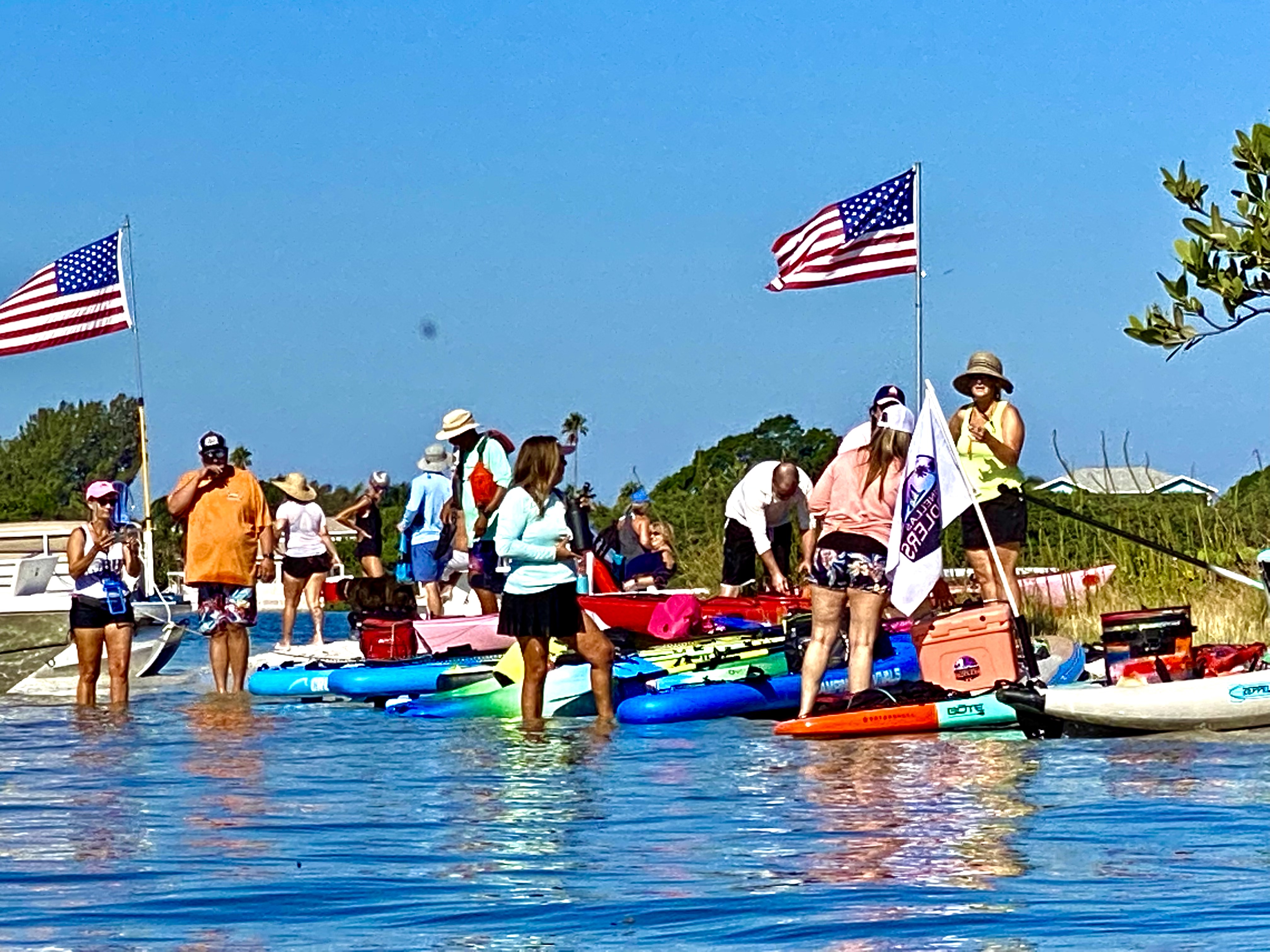 Pinellas Paddlers arrive at Buccaneer Island for a sunny beach stop.