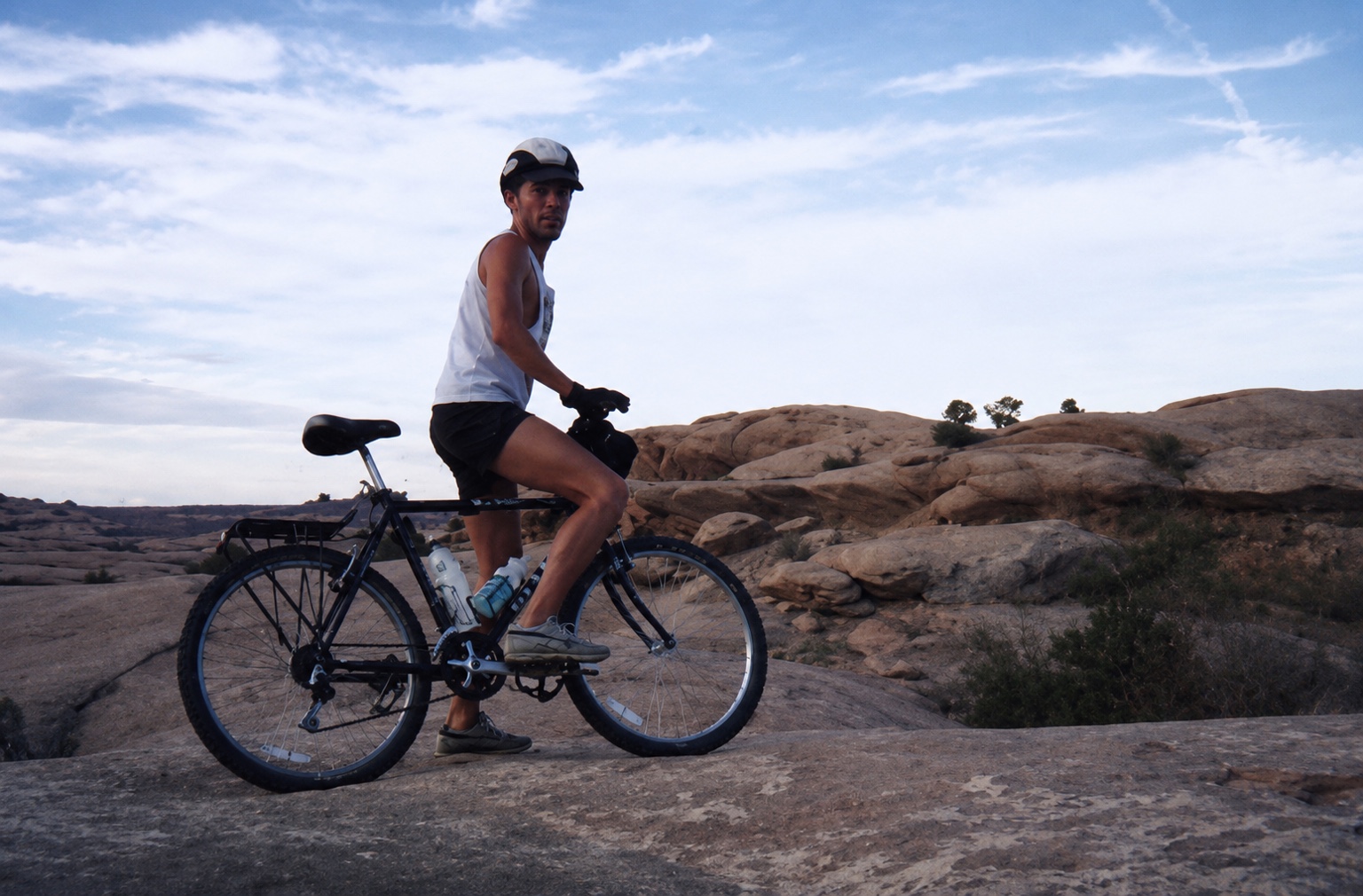 Tim mountain biking in western sandstone country