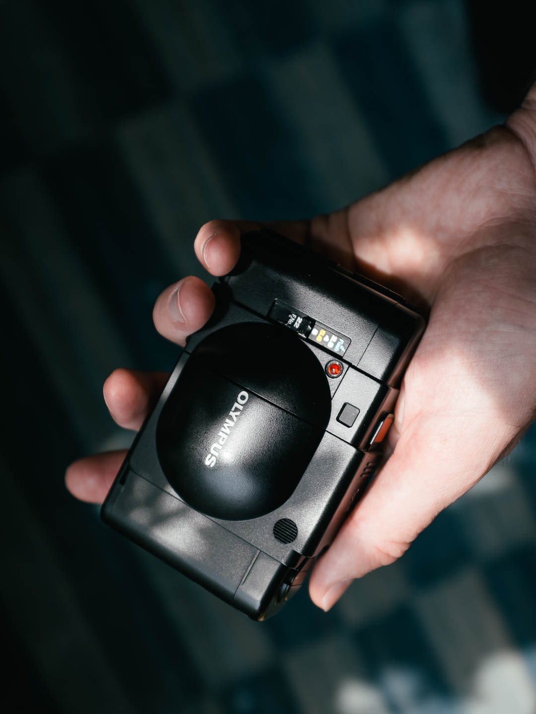 The Olympus XA closed and protected, small enough to carry almost anywhere.