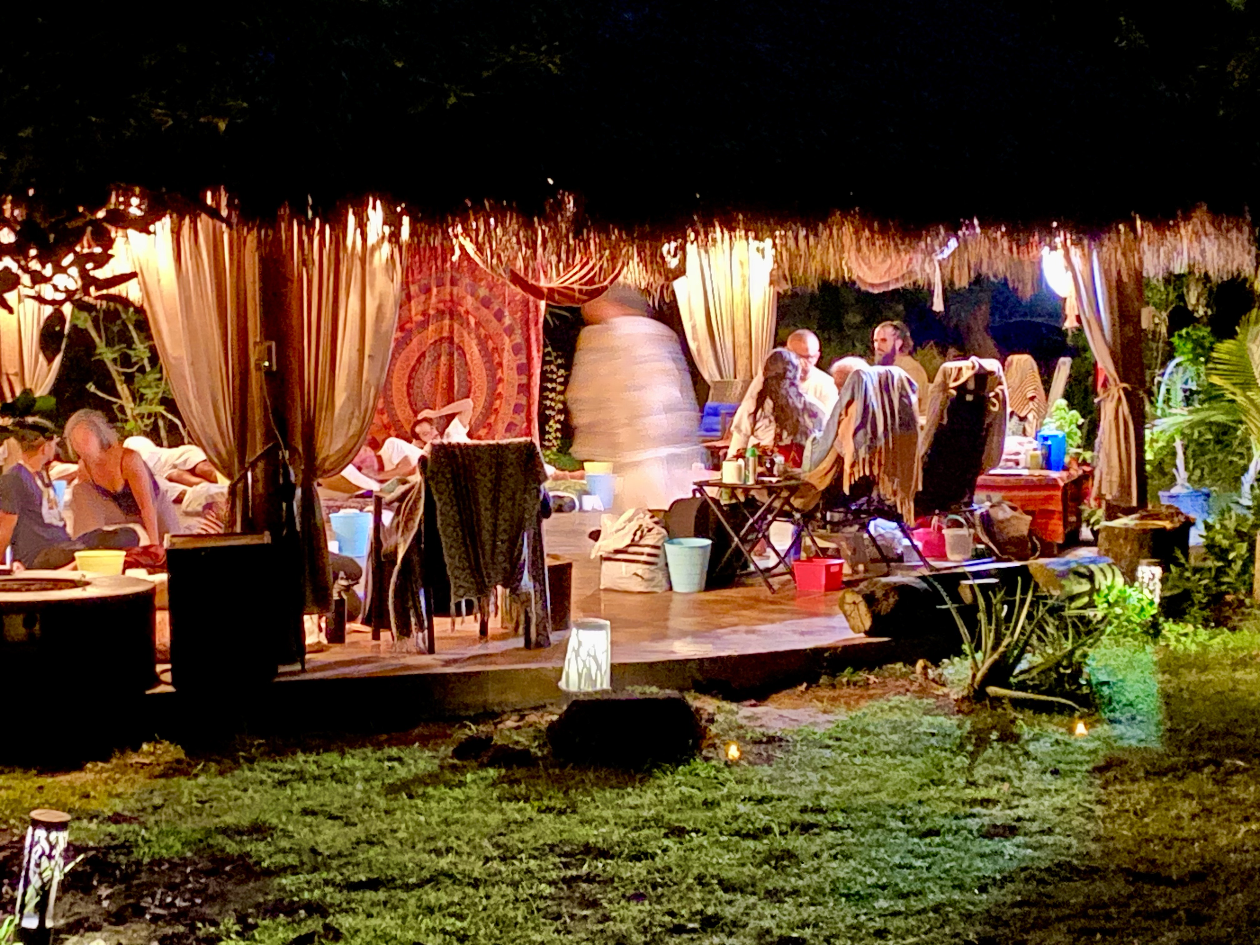 The open-air ceremony pavilion glowing warmly in the Redlands night.