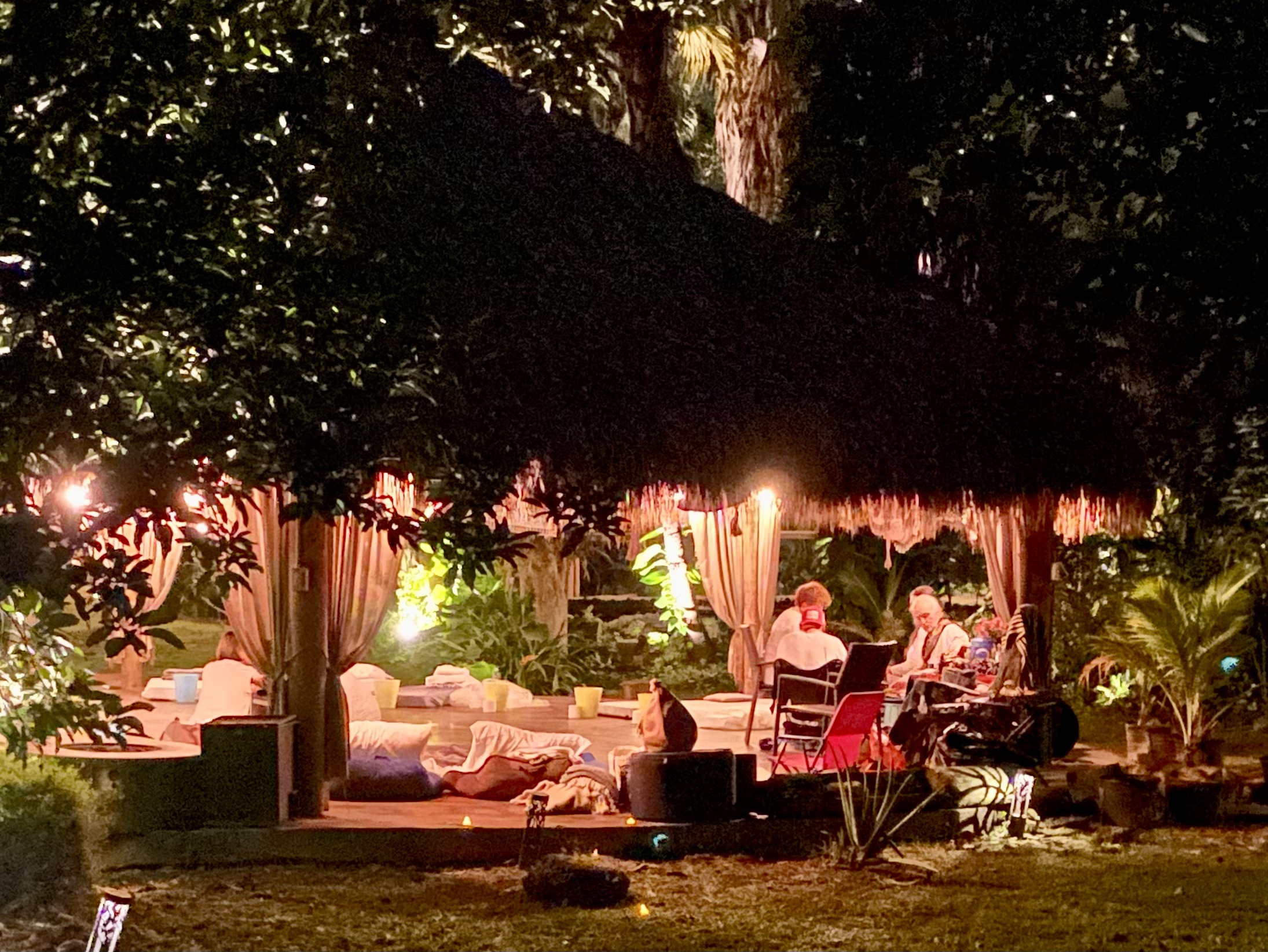 Participants resting and reflecting in the open-air ceremonial space.