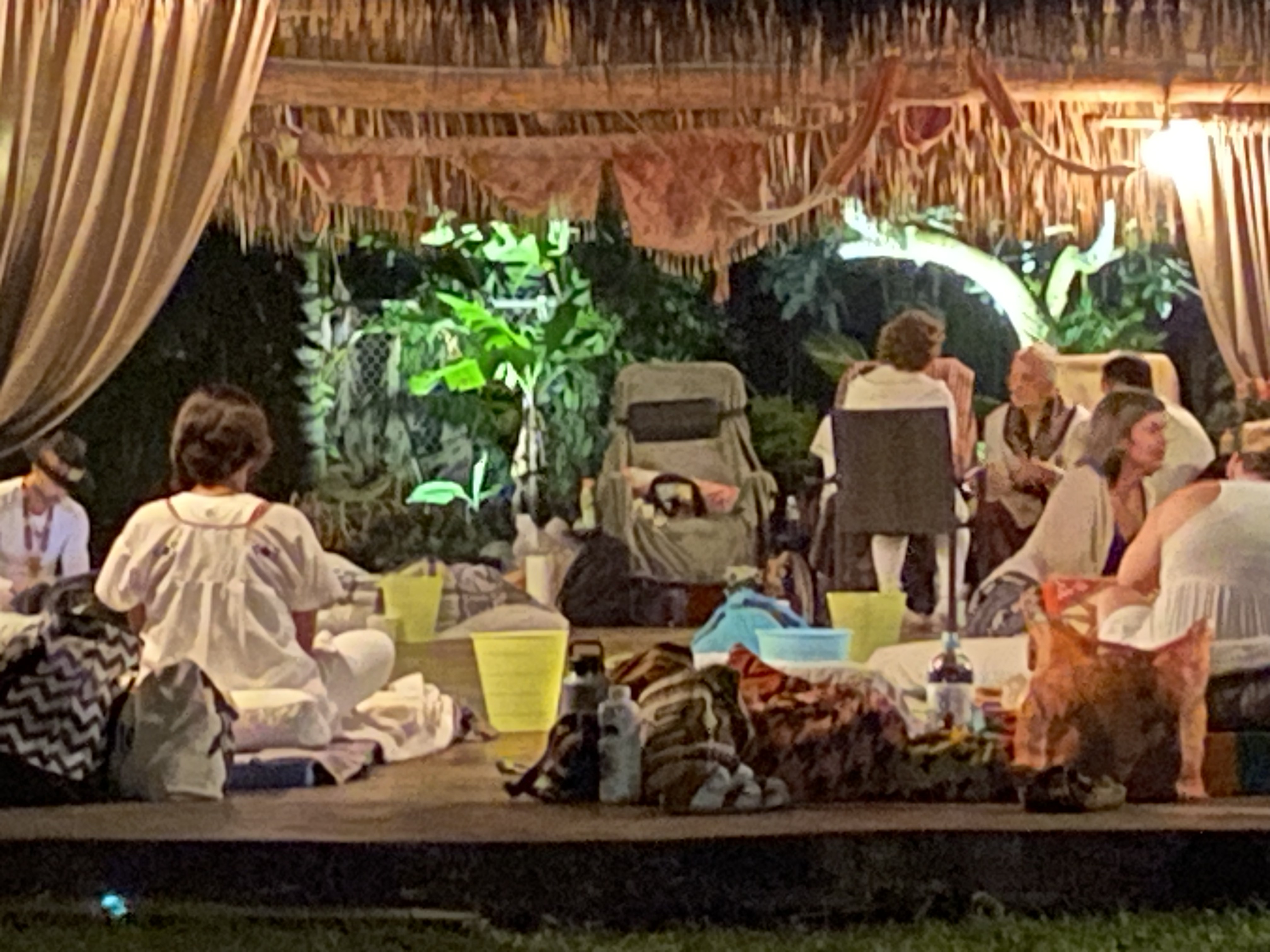 The community resting together in a safe and supportive setting.
