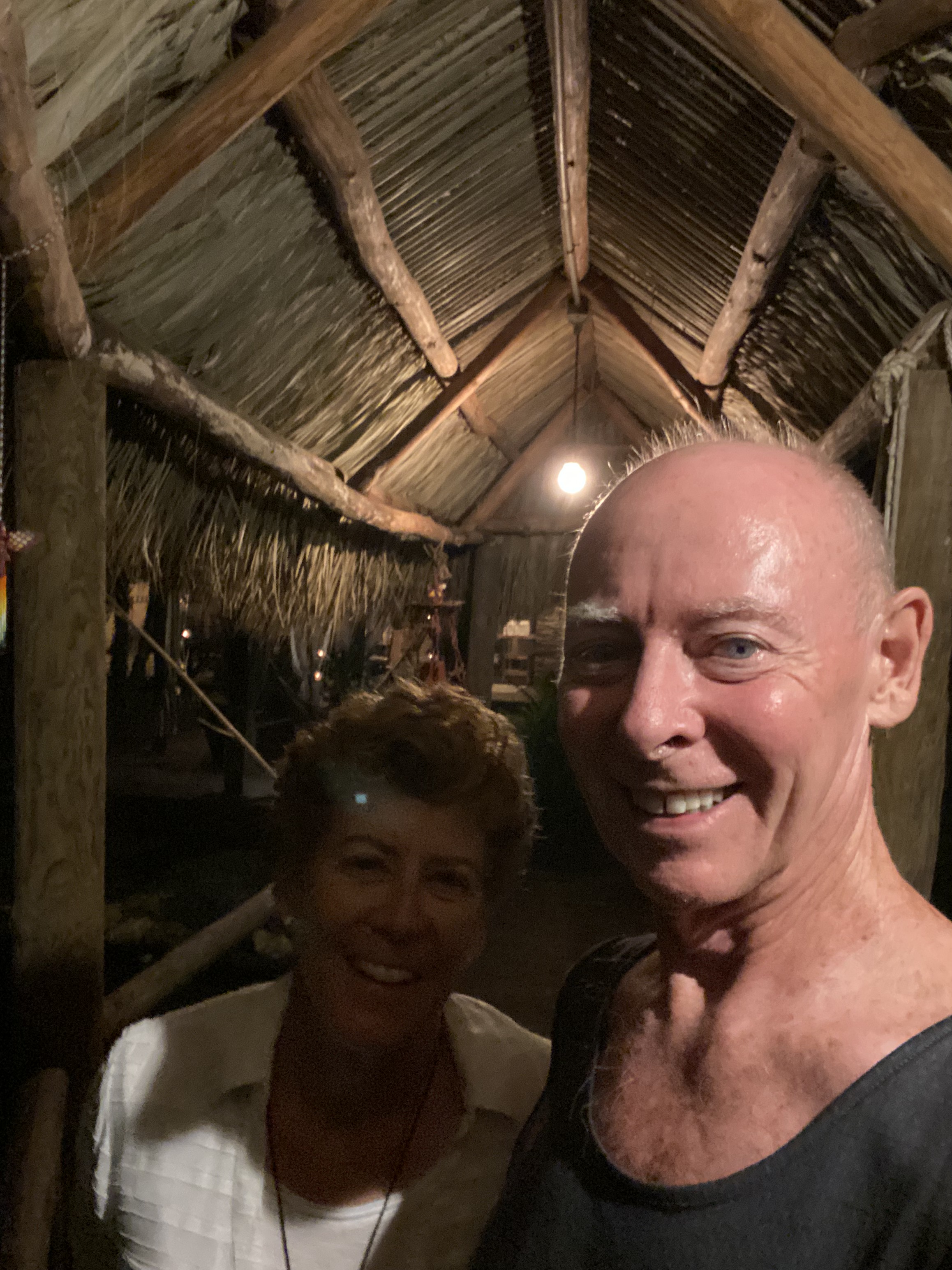 Tim and Kym together beneath the thatched roof during the Redlands weekend.