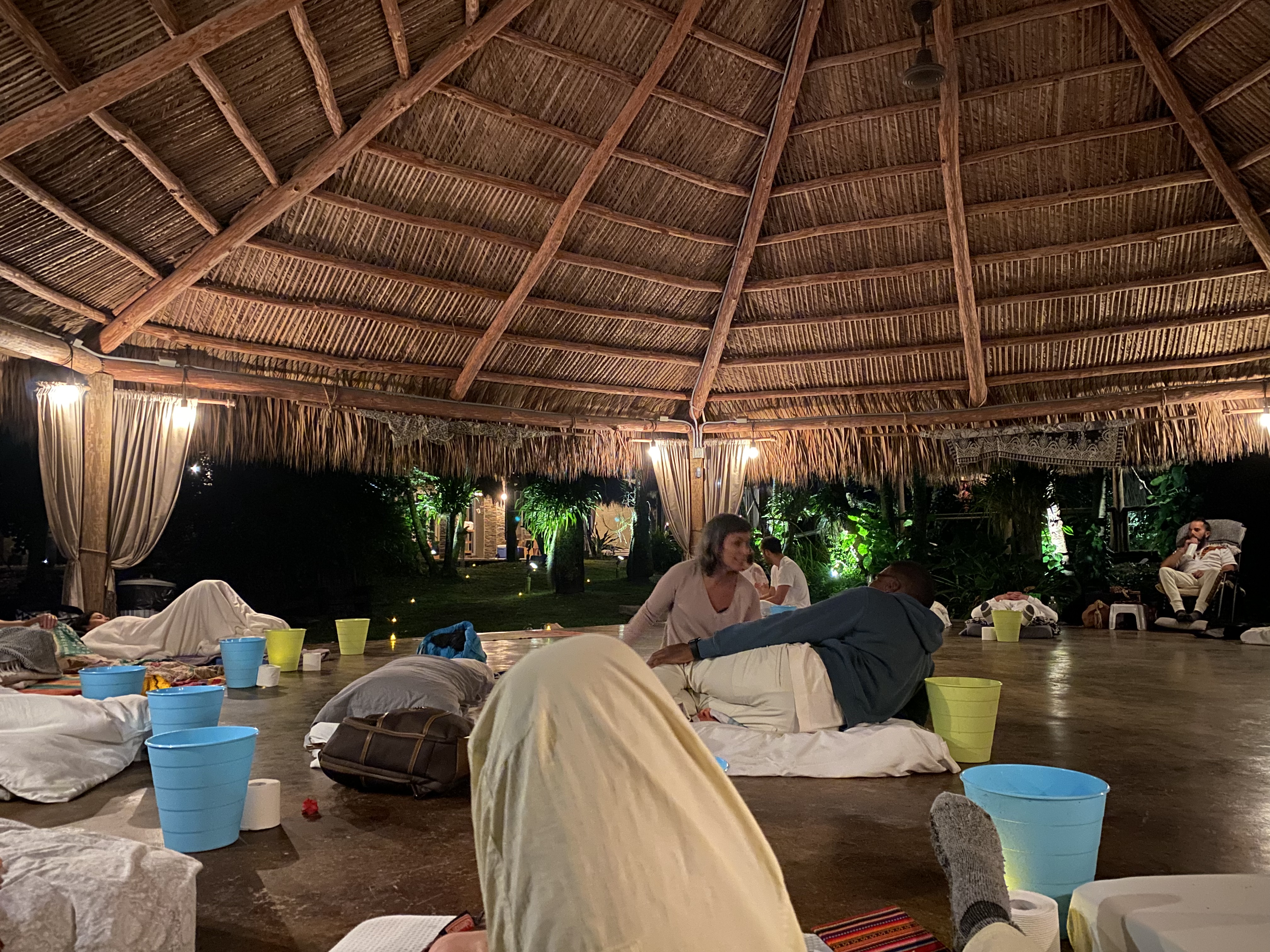 Participants resting inside the spacious, circular ceremony pavilion.