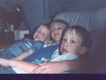 Michelle with the boys while watching a scary movie at Uncle Bob's Video Palace!