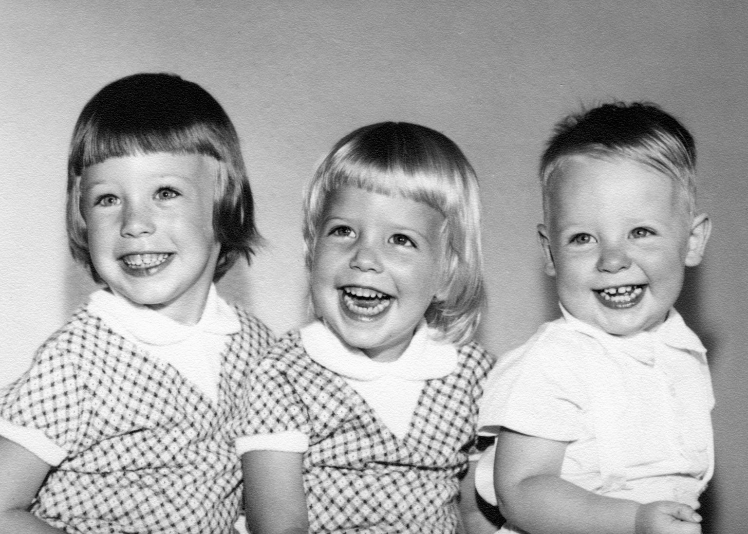 Peg, Sharlotte and Tim together as young children