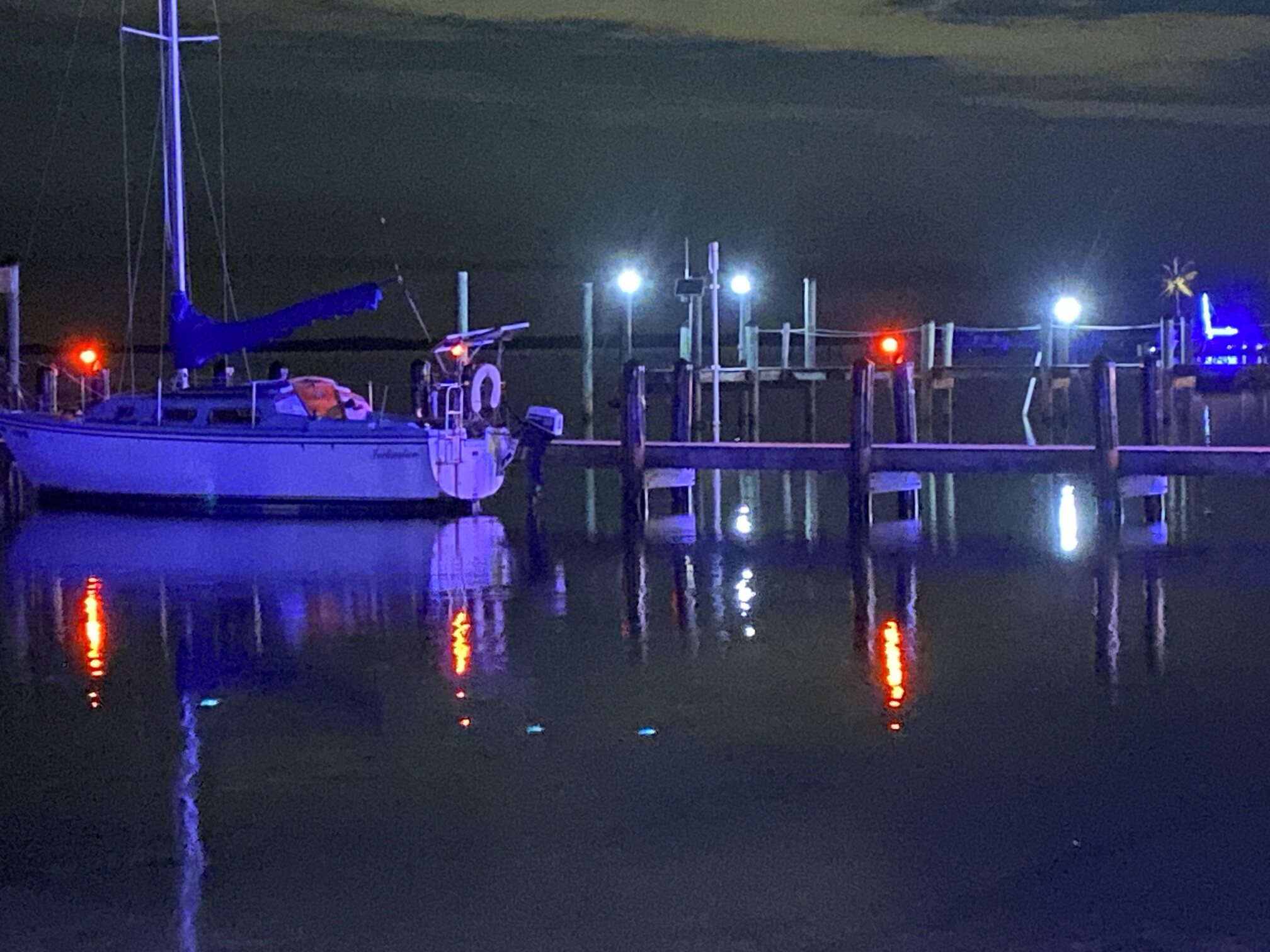 Boats resting at the marina after sunset.