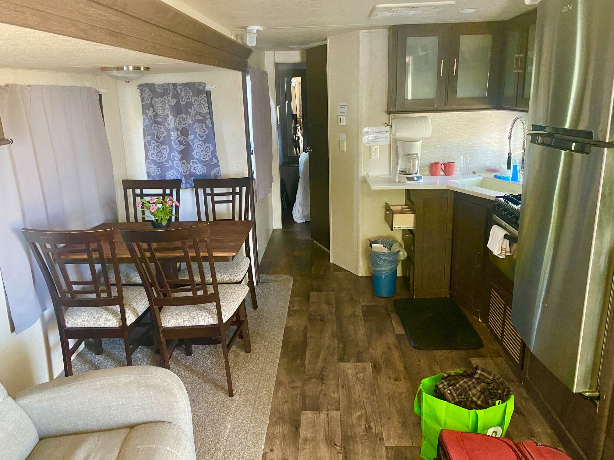 The compact living and dining area inside a cottage.