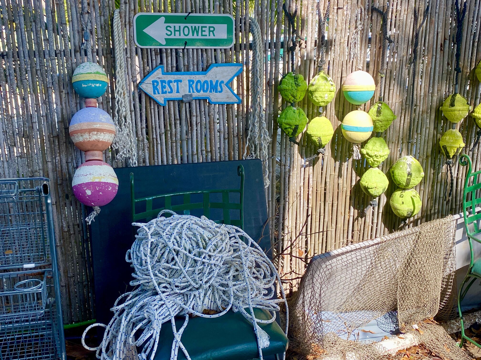 Colorful nautical decorations and old fishing gear.