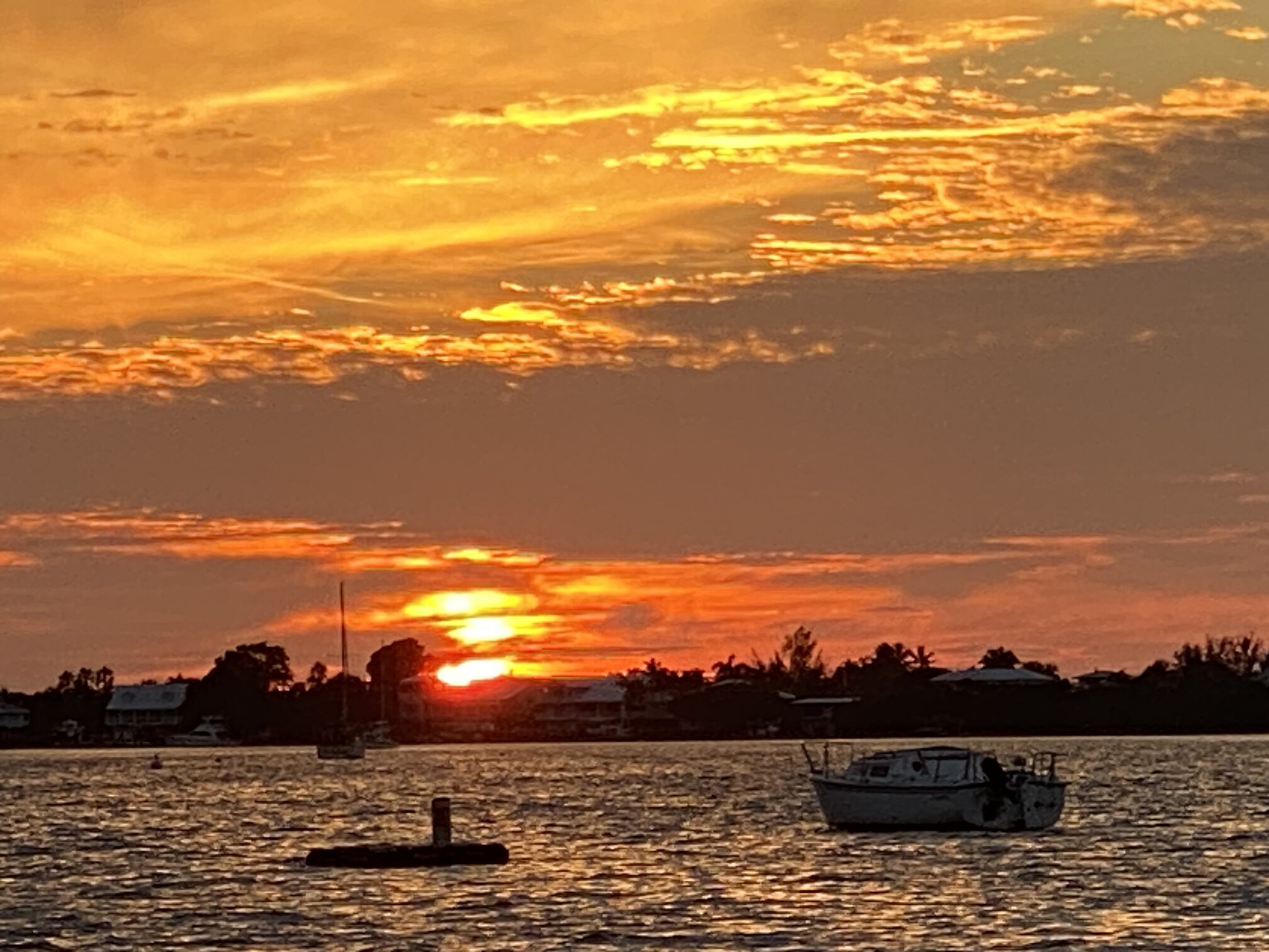 A brilliant golden sunset from the motel waterfront.