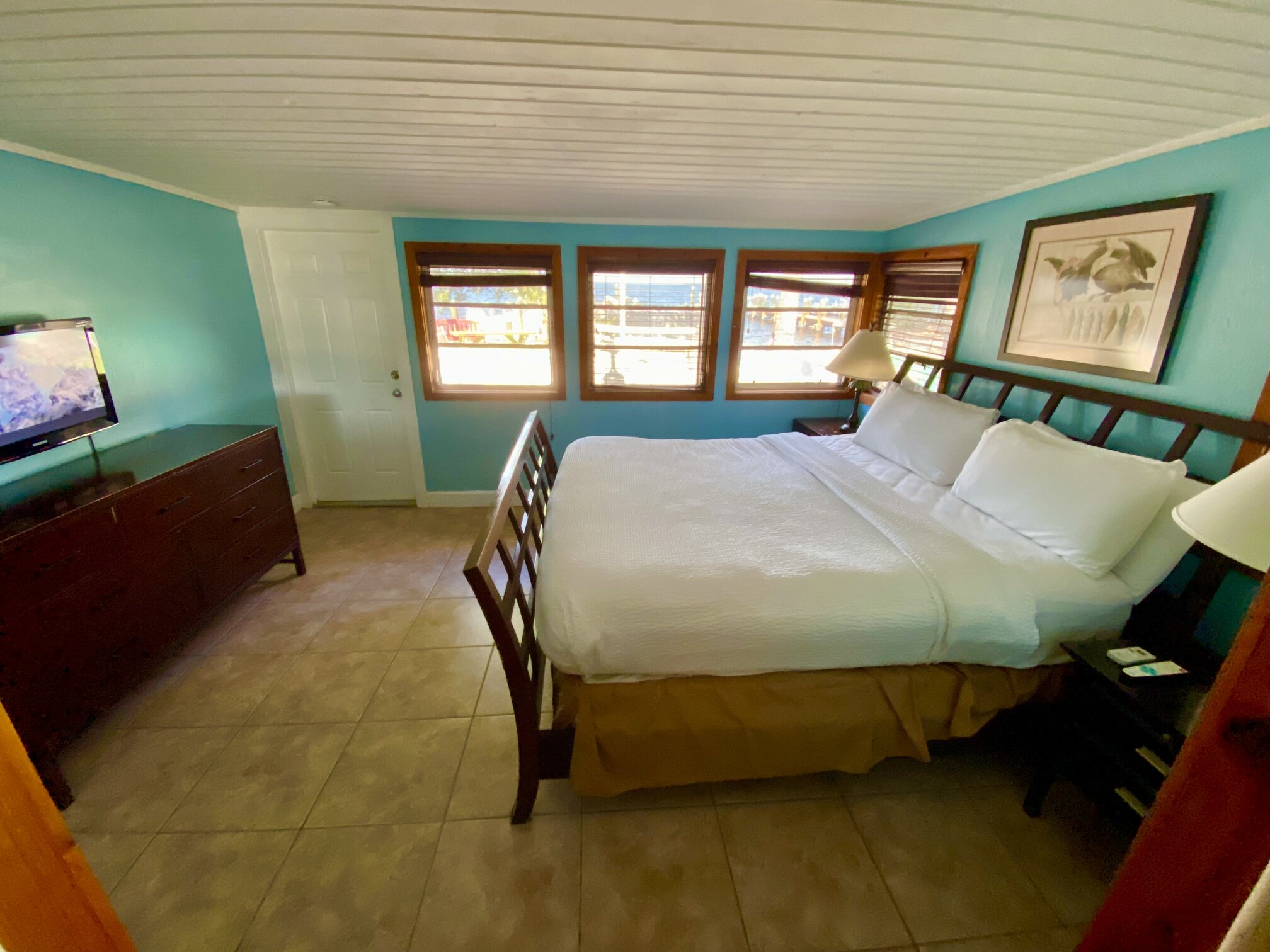 A simple, comfortable bedroom with classic Keys character.