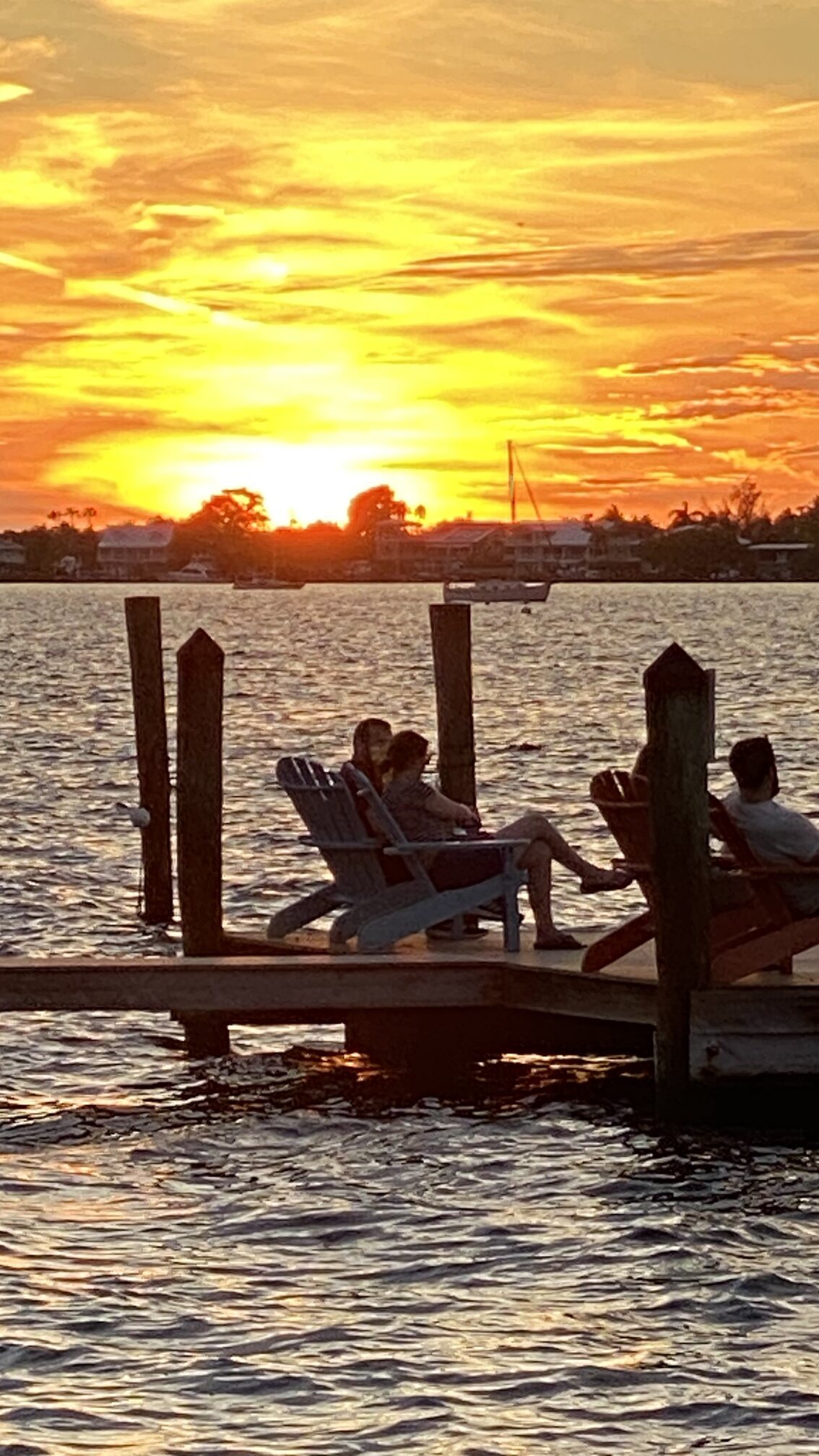 One of the simple pleasures here: sharing sunset by the water.